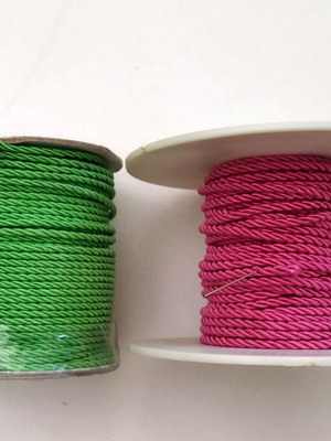 Decorative twisted cords for crafts in green and fuchsia