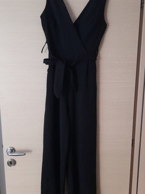 Black jumpsuit like new with zipper and belt, size M