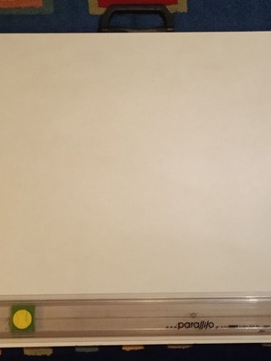 Drawing board used with parallel ruler and drawing tools