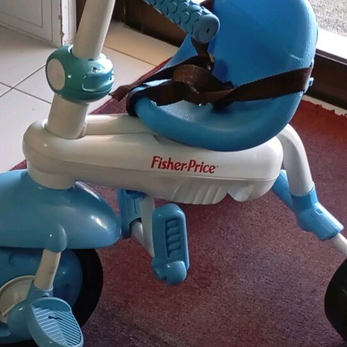 Fisher Price children's bike like new with straps and handle