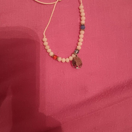 Doll like new with gift bracelet