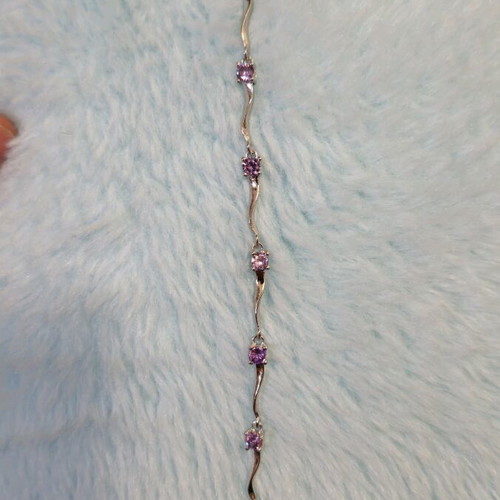 Fairy bracelet like new with purple stones and silver chain