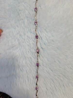 Fairy bracelet like new with purple stones and silver chain