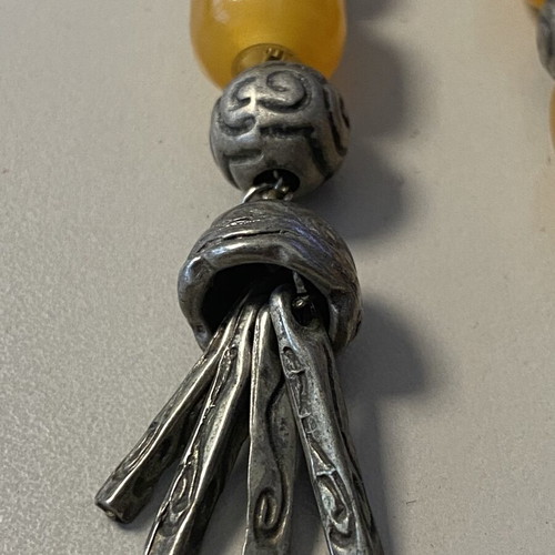 Collectible worry beads with yellow and hammered beads, 23 cm, like new