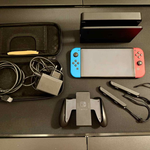 Nintendo Switch OLED used with carrying case and 256GB memory card