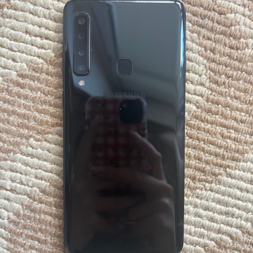 Samsung Galaxy A9 used with case and 4 screen protectors