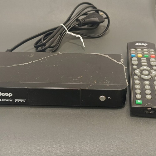 Doop DVB-T HD HDMI digital TV decoder used with remote control