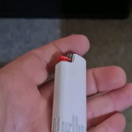 Metallic white mini lighter cases used, BiC type