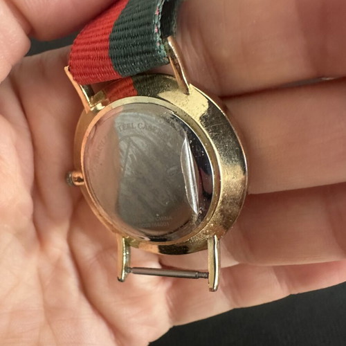 Fashion watch with gold case and NATO fabric strap