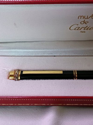 Cartier Trinity pen like new with 18k gold-plated details