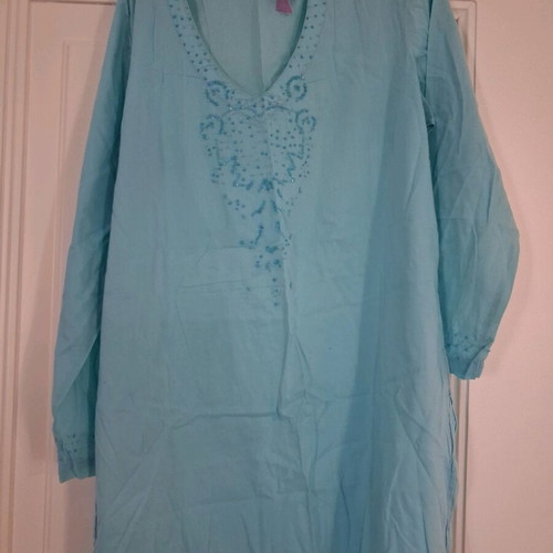 Turquoise tunic used with beads on neck and sleeves, one size