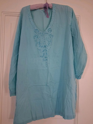 Turquoise tunic used with beads on neck and sleeves, one size