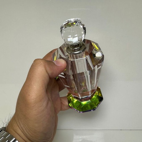 Vintage faceted crystal perfume bottle with iridescent prism base
