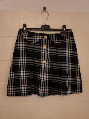Black and white checkered skirt with front buttons used, size S