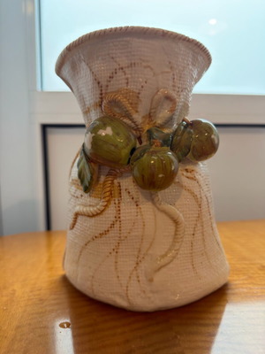 Vintage ceramic vase used with embossed fruit decoration