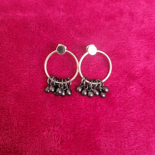 Gold-plated hoop earrings with hanging details like new