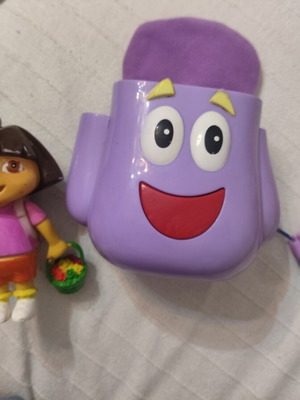 Dora the Explorer figures used, including backpack and magic flute