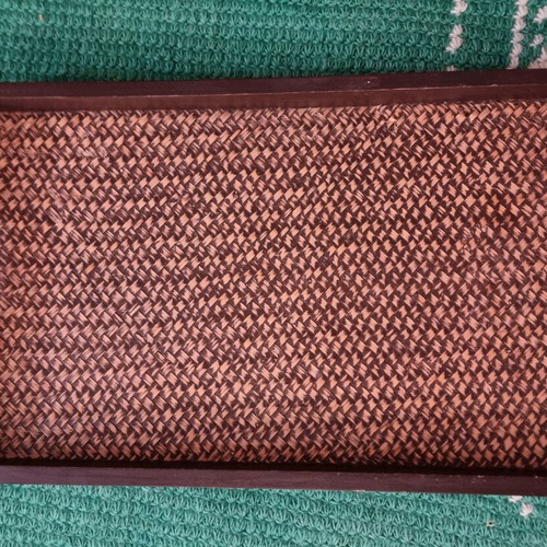 Handmade serving tray used with rattan and wood