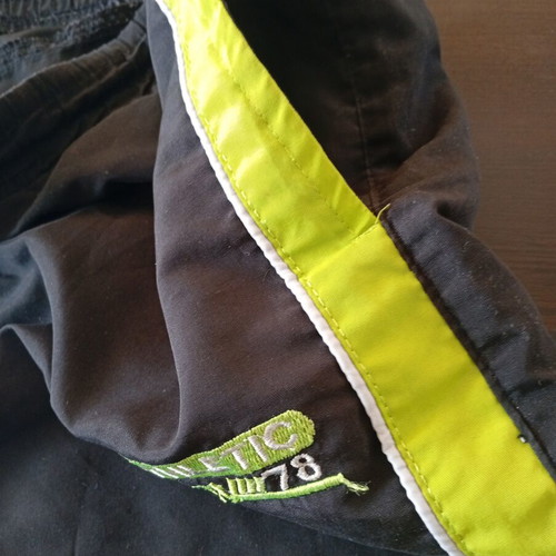 Top Tex men's swim shorts used, size Large, black and green