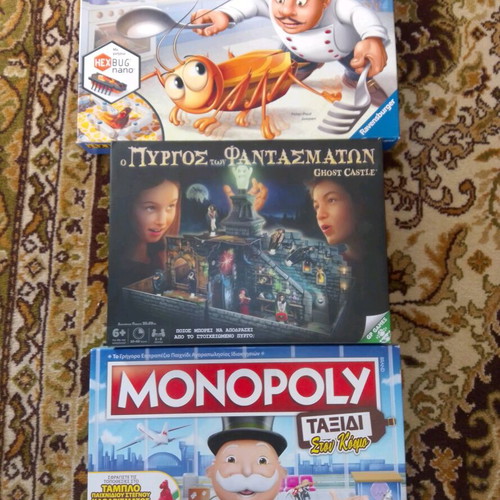 Bugs in the Kitchen and Monopoly World Tour board games like new, pack of 2