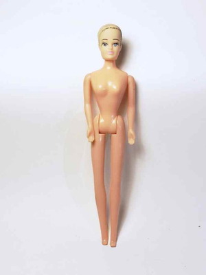 Plastic doll used, non-original without hair and clothes