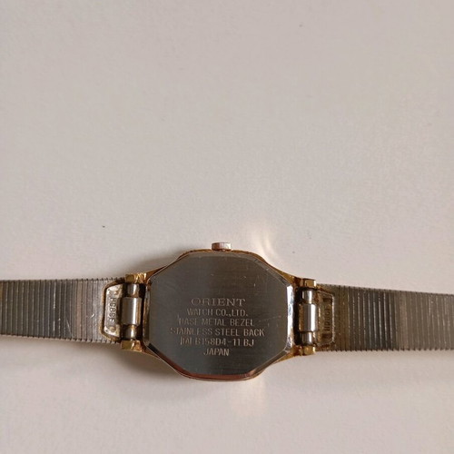 Orient vintage women's watch used, gold color, needs repair