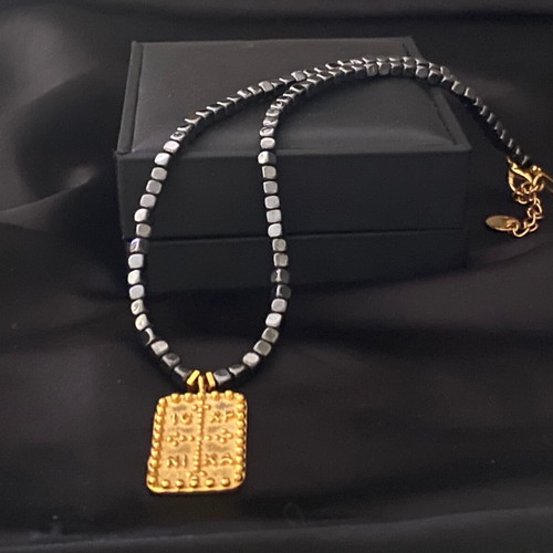 Handmade necklace with hematite semi-precious stones and steel Konstantinato motif