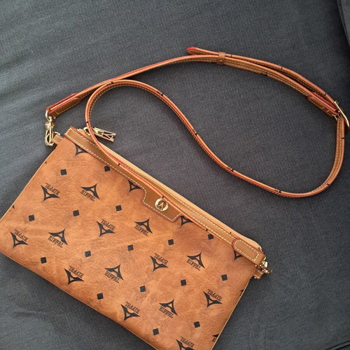 La Tour Eiffel crossbody bag like new, brown with gold details