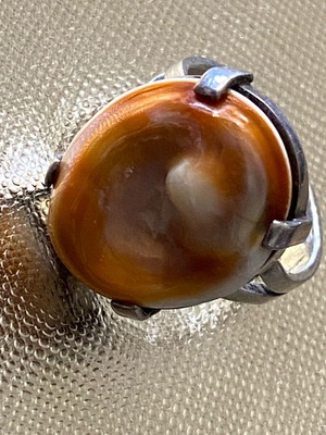 Silver ring new with orange sea eye