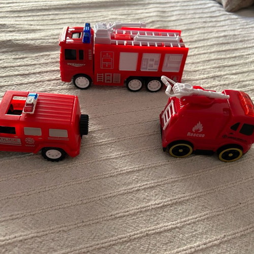 Various vehicles like new, 2 fire trucks and 1 police car