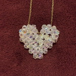 Gold necklace with crystal heart pendant