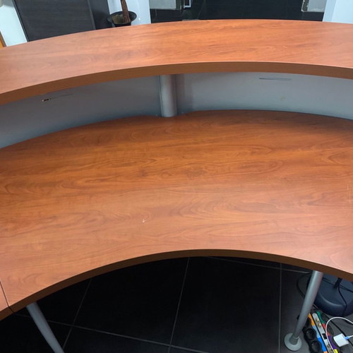 Reception desk used with metal perforated front panel