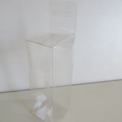Plastic transparent cases used for figures and Game Boy