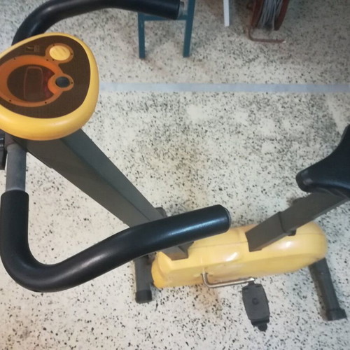 Stationary exercise bike small space-saving design
