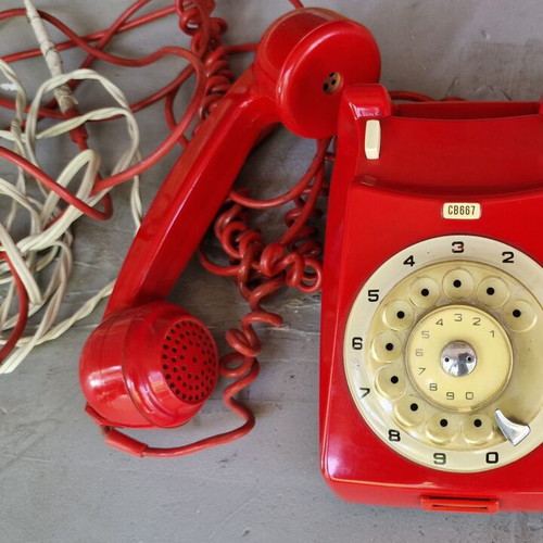 Vintage telephone from 1970s like new, red, wired