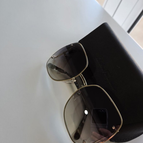 Salvatore Ferragamo sunglasses new, gold color