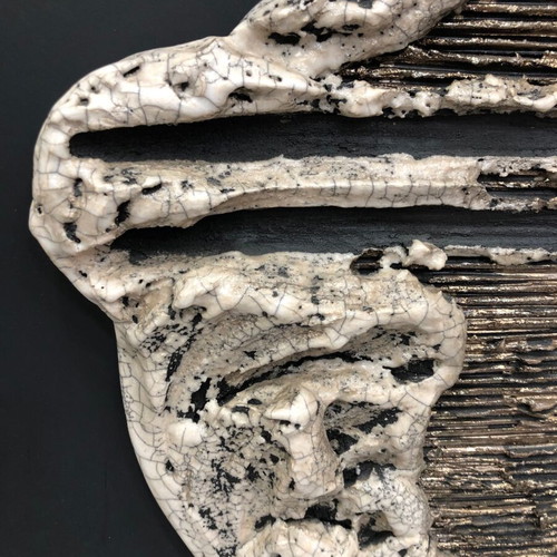 Wall ceramic sculpture used, moon on black wooden panel