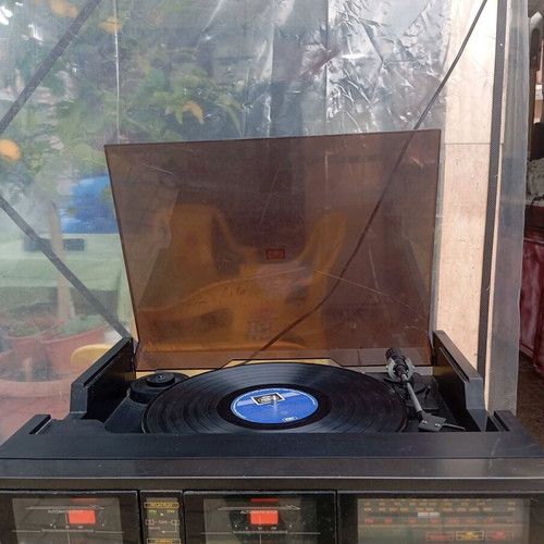 Stereo system with turntable, radio and 2 cassette players used