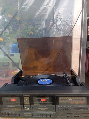 Stereo system with turntable, radio and 2 cassette players used