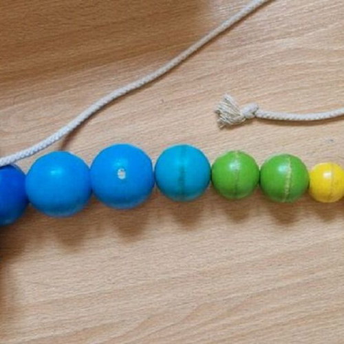 PlanToys wooden pull-along snake like new for 12+ months