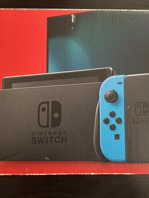 Nintendo Switch console with Joy-Con controllers and dock