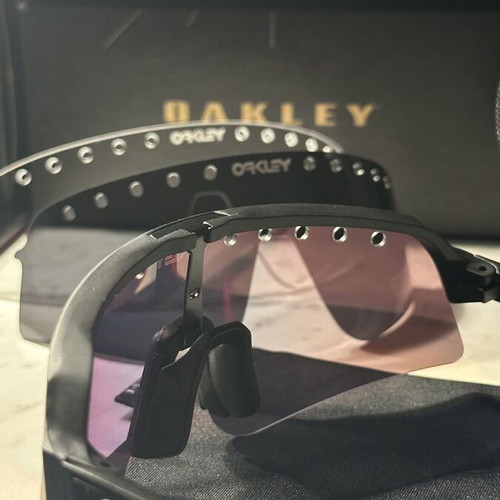 Oakley Sutro sunglasses new with two lenses black and red