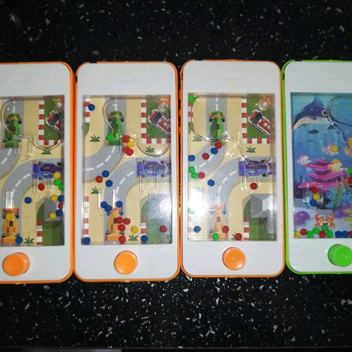 Water handheld game like new, pack of 4 for kids
