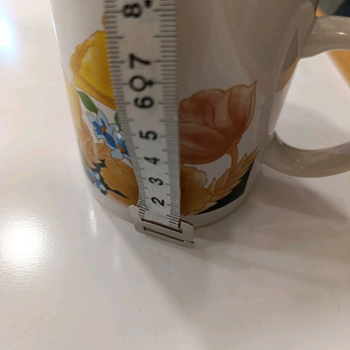 Mug with flower designs like new