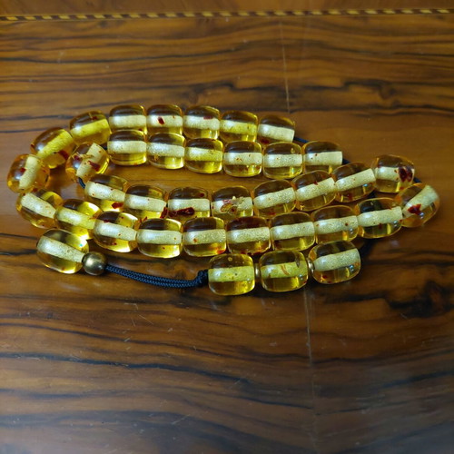 Komboloi made of high-quality resin, new, 33+4 beads amber color