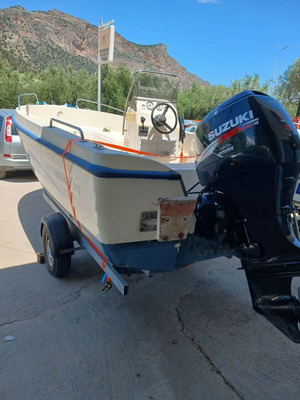 Лодка Poseidon 510 с извънбордов двигател Suzuki DF 60 к.с. като нова