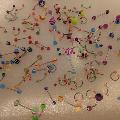 Piercing earrings set like new, 100 pieces, various designs and colors