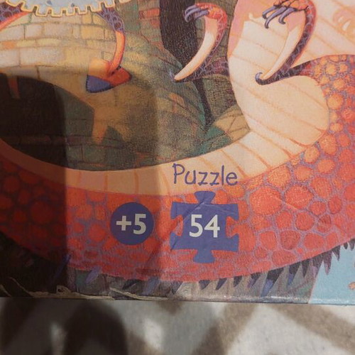 Djeco puzzle like new, 54 pieces with castle and dragons theme