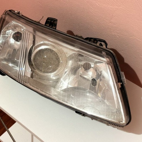 Saab 9-3 passenger side headlight used