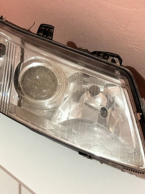 Saab 9-3 passenger side headlight used